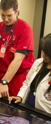 nursing student and medical student learning together