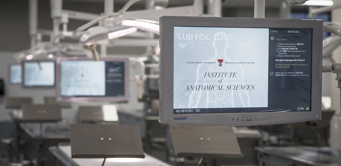 inside photo of Institute of Anatomical Sciences lab with a close up of computer monitors