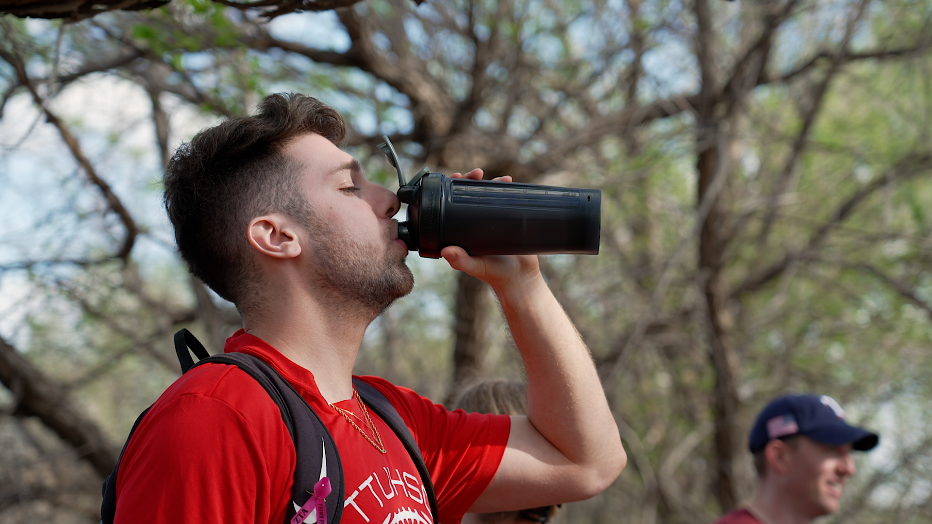 hiker drinking water