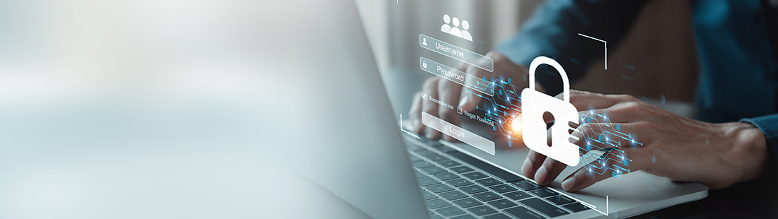 Man at keyboard with security graphics on top of image.