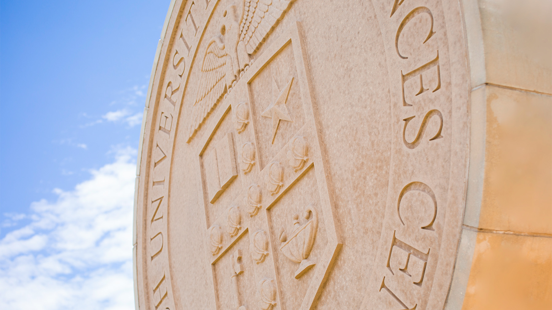 ttuhsc seal against a blue sky