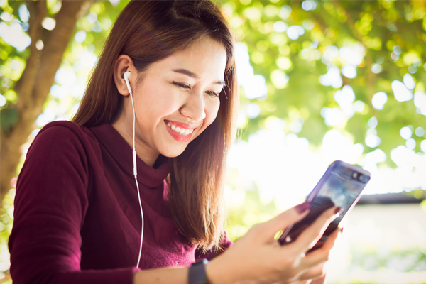 Student listening to a podcast