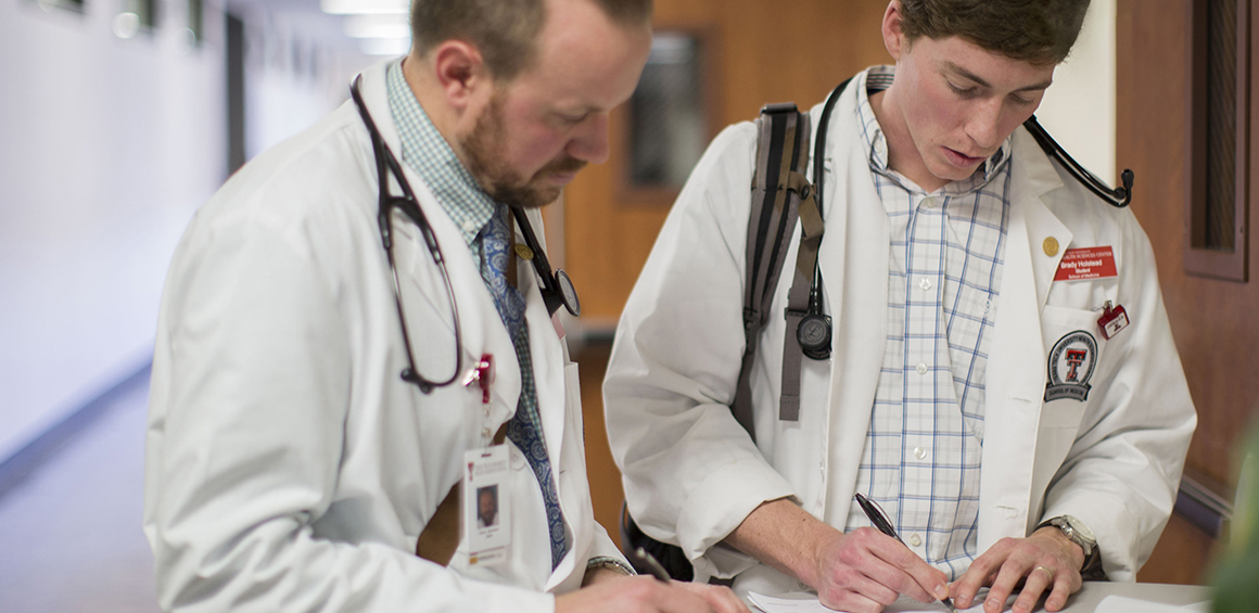 TTUHSC physicians looking over patient files