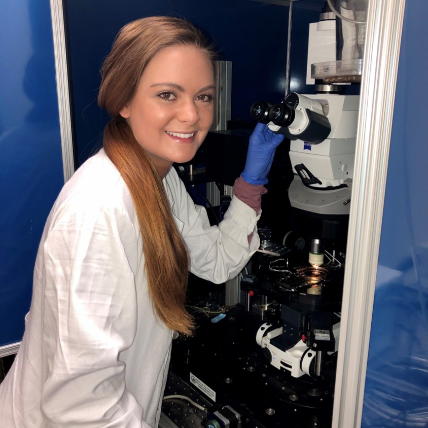 Photo of Graduate Student Peyton Presto working on Multiphoton