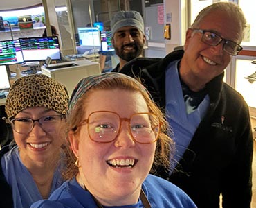 residents standing together taking a selfie