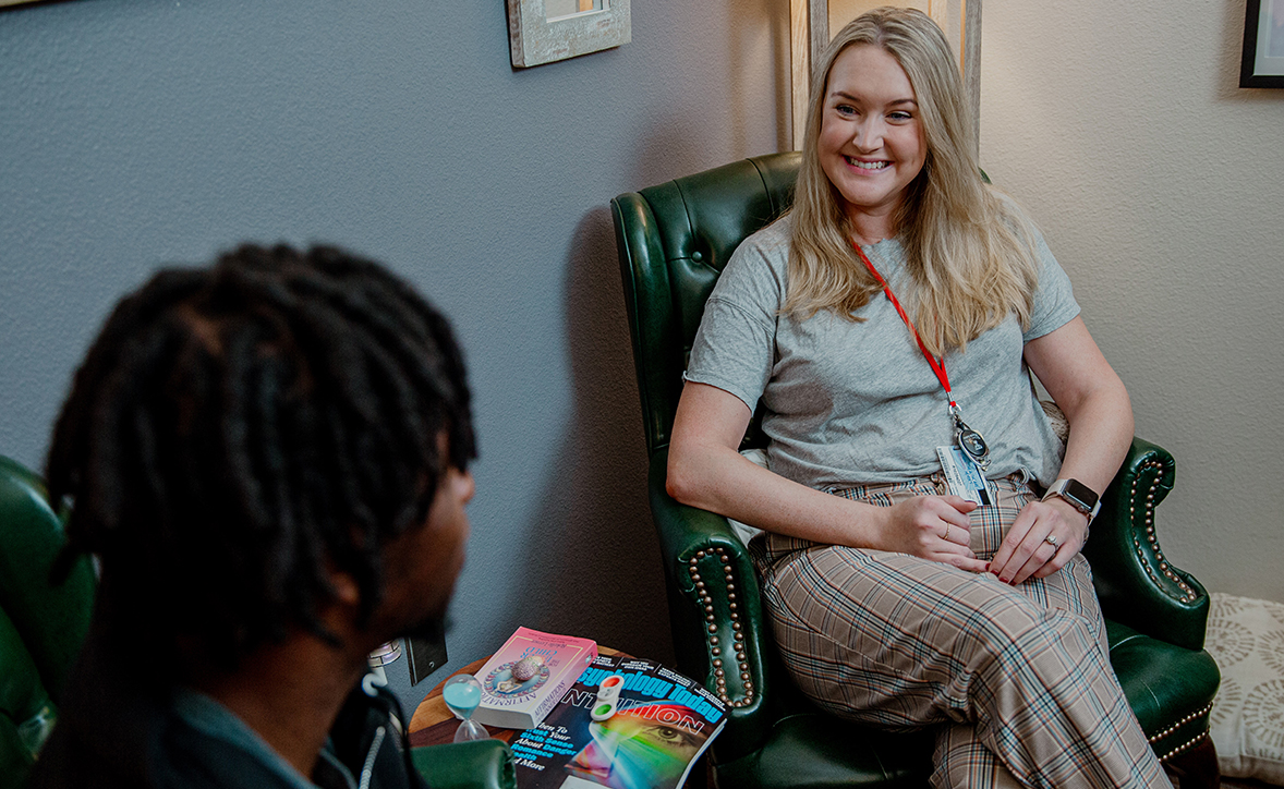 provider and student sitting in counseling room