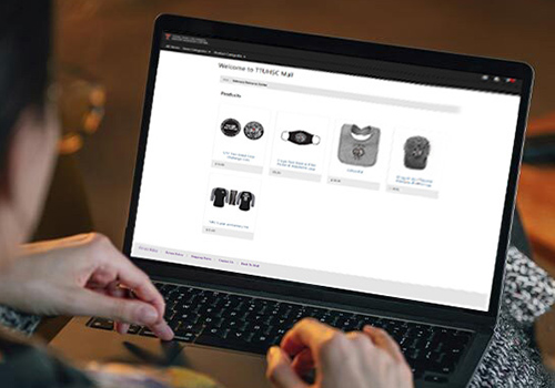 hands typing on a keyboard searching TTUHSC Sales page